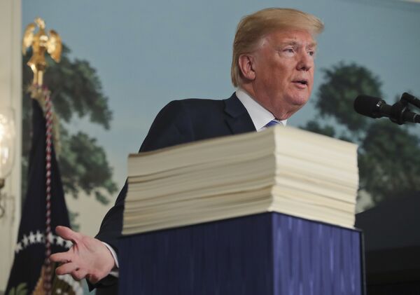 President Donald Trump speaks in the Diplomatic Room of the White House in Washington, Friday, March 23, 2018, about the $1.3 trillion spending bill. President Donald Trump speaks in the Diplomatic Room of the White House in Washington, Friday, March 23, 2018, about the $1.3 trillion spending bill. - Sputnik International