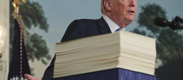 President Donald Trump speaks in the Diplomatic Room of the White House in Washington, Friday, March 23, 2018, about the $1.3 trillion spending bill. President Donald Trump speaks in the Diplomatic Room of the White House in Washington, Friday, March 23, 2018, about the $1.3 trillion spending bill. - Sputnik International