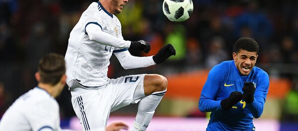 From left: Alexander Yerokhin (Russia) and Taison (Brazil) during a friendly football match between the national teams of Russia and Brazil From left: Alexander Yerokhin (Russia) and Taison (Brazil) during a friendly football match between the national teams of Russia and Brazil - Sputnik International