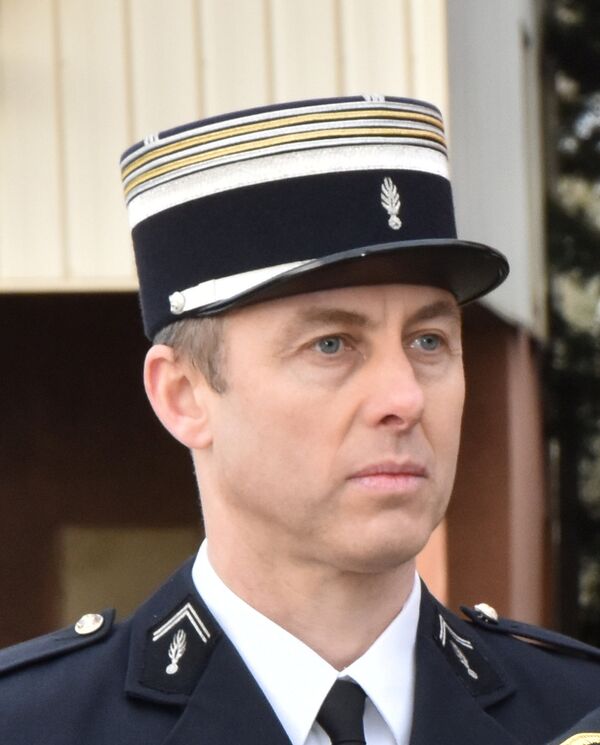 A photo released by the French Gendarmerie shows Lieutenant-Colonel Arnaud Beltrame, the gendarme who voluntarily took the place of a hostage during a deadly supermarket siege in southwestern France on Friday, March 23, 2018. - Sputnik International