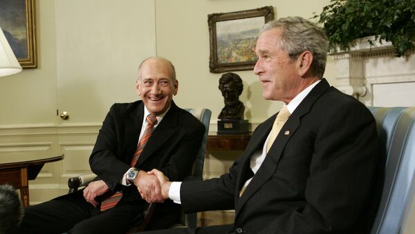 President Bush, right, shakes hands with Israeli Prime Minister Ehud Olmert, Wednesday, June 4, 2008, in the Oval Office of the White House - Sputnik International