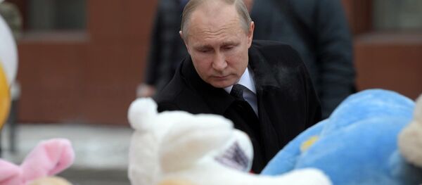Russian President Vladimir Putin lays flowers at an impromptu memorial near the Zimnyaya Vishnya shopping mall in Kemerovo to honor those killed in the shopping mall fire Russian President Vladimir Putin lays flowers at an impromptu memorial near the Zimnyaya Vishnya shopping mall in Kemerovo to honor those killed in the shopping mall fire - Sputnik International