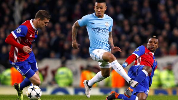 Champions League Round of 16 Second Leg - Manchester City vs FC Basel - Etihad Stadium, Manchester, Britain - March 7, 2018 Manchester City's Gabriel Jesus in action with Basel’s Serey Die and Fabian Frei - Sputnik International