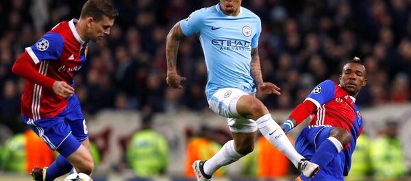 Champions League Round of 16 Second Leg - Manchester City vs FC Basel - Etihad Stadium, Manchester, Britain - March 7, 2018 Manchester City's Gabriel Jesus in action with Basel’s Serey Die and Fabian Frei - Sputnik International