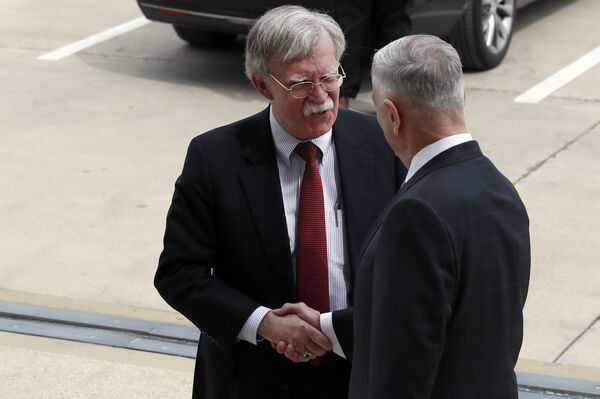 President Donald Trump's pick for national security adviser John Bolton, left, shakes hands with Defense Secretary Jim Mattis, as Bolton arrives at the Pentagon, Thursday, March 29, 2018, in Washington. President Donald Trump's pick for national security adviser John Bolton, left, shakes hands with Defense Secretary Jim Mattis, as Bolton arrives at the Pentagon, Thursday, March 29, 2018, in Washington. - Sputnik International
