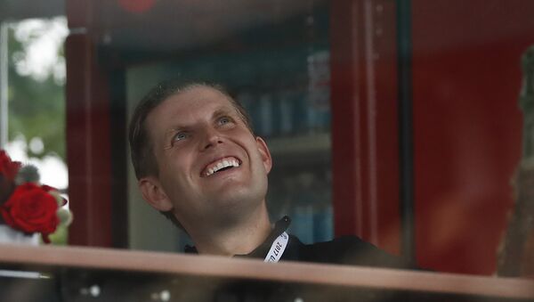 Eric Trump, the son of President Donald Trump, looks out from the presidential viewing stand, Friday, July 14, 2017, at Trump National Golf Club in Bedminster, N.J.  - Sputnik International