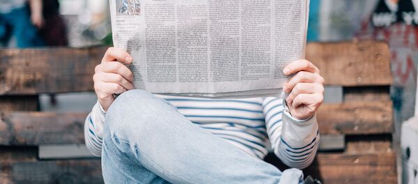 Reading a newspaper - Sputnik International