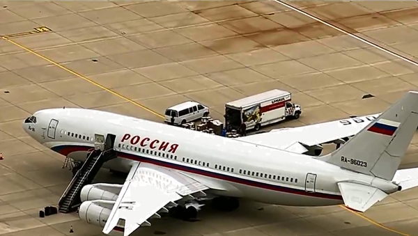 A Rossiya Ilyushin Il-96-300 picking up expelled Russian diplomats at Dulles International Airport near Washington, DC - Sputnik International