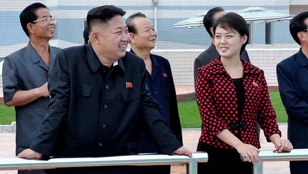 North Korean leader Kim Jong Un, front left, accompanied by his wife Ri Sol Ju, front right, inspects the Rungna People's Pleasure Ground in Pyongyang - Sputnik International