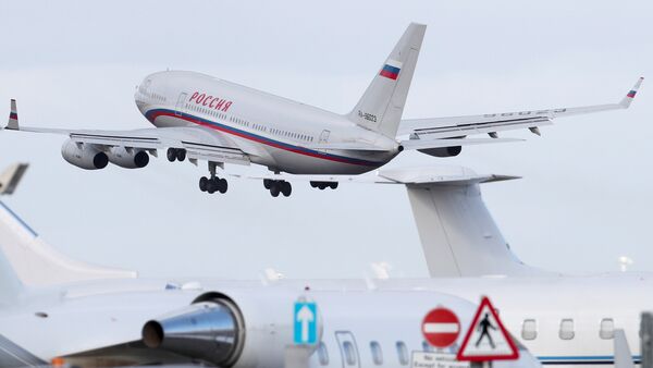 An aircraft sent to collect diplomats and their families from Russia's embassy in London, who were expelled by Britain after the poisoning of former Russian intelligence officer Sergei Skripal and his daughter Yulia in Salisbury, takes off from Stansted aiport, Britain, March 20, 2018. - Sputnik International