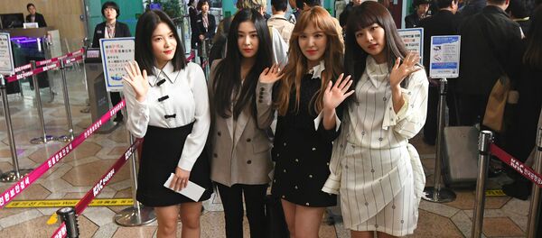 Members of K-pop girlband Red Velvet pose for a photo before departing for Pyongyang from Gimpo International Airport in Seoul Members of K-pop girlband Red Velvet pose for a photo before departing for Pyongyang from Gimpo International Airport in Seoul - Sputnik International