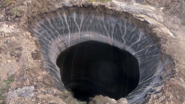 A view of a giant crater discovered in Yamalo-Nenets Autonomous Okrug. (File) - Sputnik International