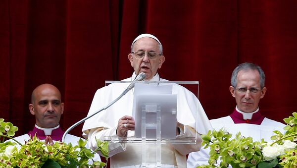 Pope Francis delivers his Easter message in the Urbi et Orbi (to the city and the world) address from the balcony overlooking St. Peter's Square at the Vatican - Sputnik International