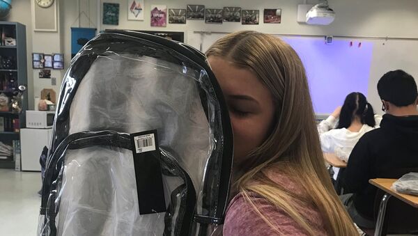 A Marjory Stoneman Douglas High School student poses with a clear backpack, provided to her as a new security measure, in Parkland, Florida, U.S., April 2, 2018 in this image obtained from social media - Sputnik International
