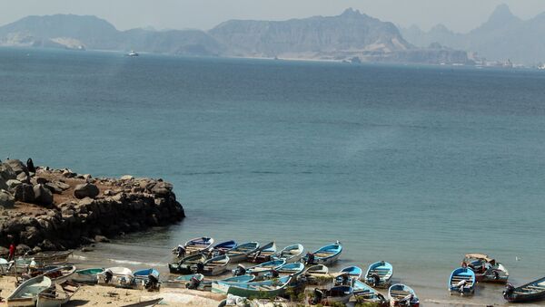 (File) Fishing boats are moored along the sand on Gold More beach on the outskirts of the southern city of Aden, situated at the mouth of the Red Sea, on November 30, 2010 - Sputnik International