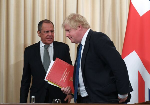 Russian Foreign Minister Sergei Lavrov and British Foreign Secretary Boris Johnson - Sputnik International