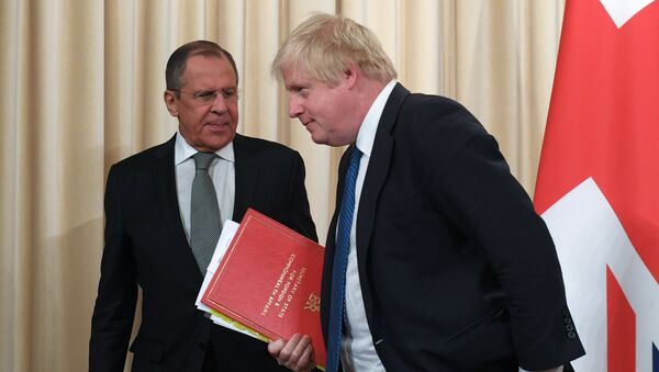 Russian Foreign Minister Sergei Lavrov and British Foreign Secretary Boris Johnson - Sputnik International