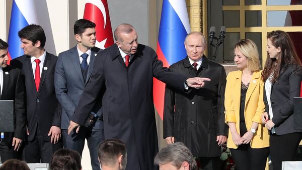 Turkish President Tayyip Erdogan (3rdL) and his Russian counterpart Vladimir Putin (3rdR) attend a symbolic ground-breaking ceremony for Turkey's first nuclear power station at the Presidential Palace in Ankara on April 3, 2018 - Sputnik International