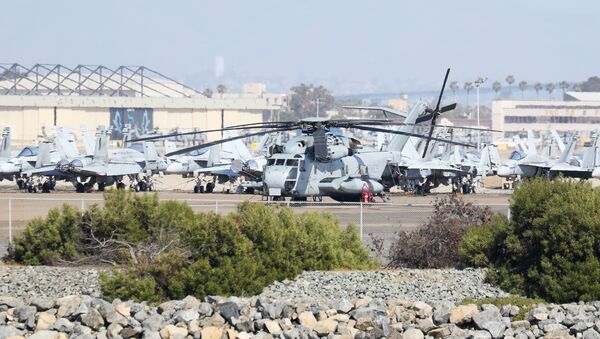 A United States Marine Corps CH-53E Super Stallion Helicopter sits at North Island Naval Air Station Coronado, California, April 12, 2015 - Sputnik International