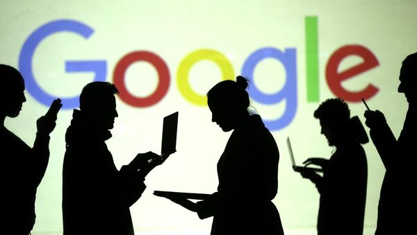 Silhouettes of laptop and mobile device users are seen next to a screen projection of Google logo in this picture illustration taken March 28, 2018 - Sputnik International