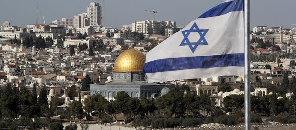 The Israeli flag flutters in front of the Dome of the Rock mosque and the city of Jerusalem, on December 1, 2017 The Israeli flag flutters in front of the Dome of the Rock mosque and the city of Jerusalem, on December 1, 2017 - Sputnik International