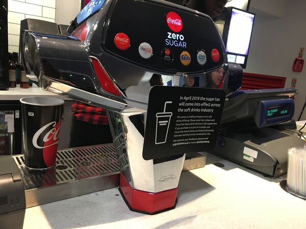 A note stating changes to soft drinks offering in one of London's cinemas.  - Sputnik International