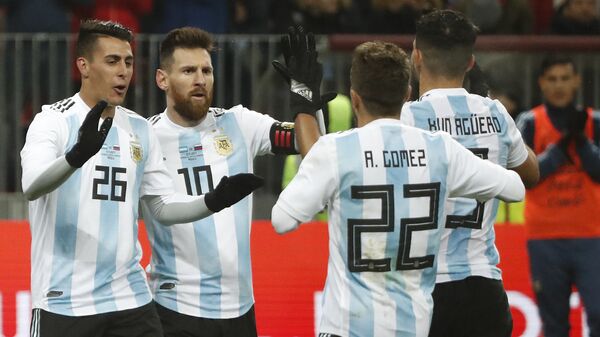 Argentina's Sergio Aguero (9) celebrates with team mates Alejandro Gomez (22), Cristian Pavon (26) and Lionel Messi (10) after scoring his side's opening goal during the international friendly soccer match between Russia and Argentina at Luzhniki World Cup 2018 stadium in Moscow, Russia, Saturday, Nov. 11, 2017. - Sputnik International