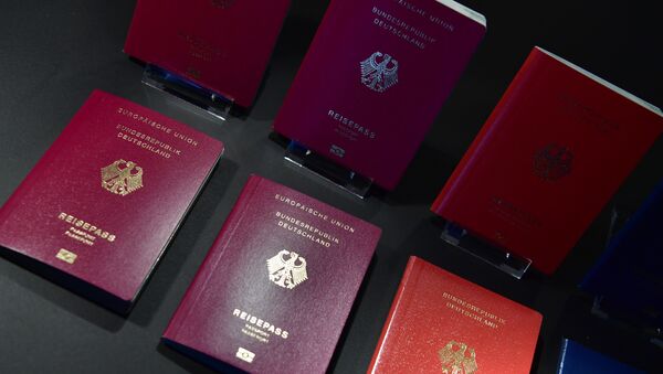 The new German electronic passport is presented during an official press conference on February 23, 2017 in Berlin - Sputnik International