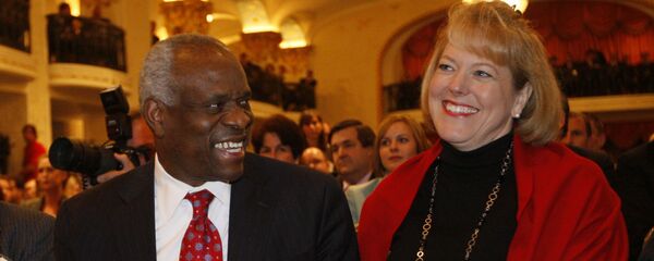 FILE - In this Nov. 15, 2007, photo, Supreme Court Justice Clarence Thomas, left, sits with his wife Virginia Thomas, as he is introduced at the Federalist Society in Washington, where he spoke about his new book and took questions from the audience. - Sputnik International
