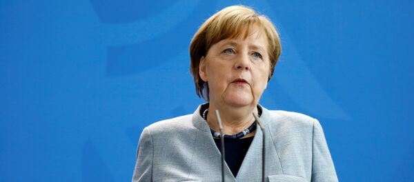 German Chancellor Angela Merkel speaks during a joint press conference with Ukraine's President after talks about fragile truce on April 10, 2018 in Berlin German Chancellor Angela Merkel speaks during a joint press conference with Ukraine's President after talks about fragile truce on April 10, 2018 in Berlin - Sputnik International