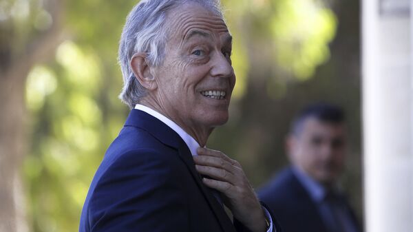 Former British Prime Minister Tony Blair arrives at the presidential palace for a meeting with Cyprus' President Nicos Anastasiades in capital Nicosia, Cyprus, Wednesday, April 4, 2018. - Sputnik International