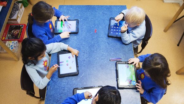 Nursery school pupils work with iPads (photo used for illustration purpose) - Sputnik International