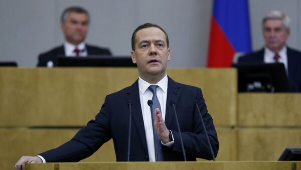 Prime Minister Dmitry Medvedev presents the 2017 Government performance report at the State Duma - Sputnik International