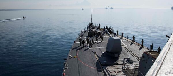 U.S. Navy sailors man the rails aboard the Arleigh Burke-class guided-missile destroyer USS Donald Cook as the ship departs Larnaca, Cyprus, April 9, 2018 - Sputnik International