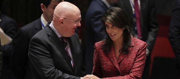 Russian Ambassador to the United Nations Vasily Nebenzya, left, and United States Ambassador to the U.N. Nikki Haley shake hands before a Security Council meeting, Tuesday, April 10, 2018, at U.N. headquarters Russian Ambassador to the United Nations Vasily Nebenzya, left, and United States Ambassador to the U.N. Nikki Haley shake hands before a Security Council meeting, Tuesday, April 10, 2018, at U.N. headquarters - Sputnik International