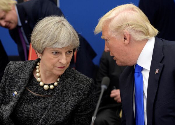 US President Donald Trump, right, speaks to British Prime Minister Theresa May in a working dinner meeting during the NATO summit of heads of state and government at the NATO headquarters, in Brussels on Thursday, May 25, 2017. US President Donald Trump, right, speaks to British Prime Minister Theresa May in a working dinner meeting during the NATO summit of heads of state and government at the NATO headquarters, in Brussels on Thursday, May 25, 2017. - Sputnik International