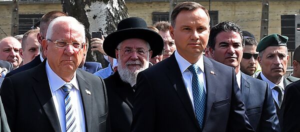 Poland's President Andrzej Duda (R) and Israel's President Reuven Rivlin (L) attend the March of the Living, a yearly Holocaust remembrance march between the former death camps of Auschwitz and Birkenau, in Oswiecim Poland's President Andrzej Duda (R) and Israel's President Reuven Rivlin (L) attend the March of the Living, a yearly Holocaust remembrance march between the former death camps of Auschwitz and Birkenau, in Oswiecim - Sputnik International