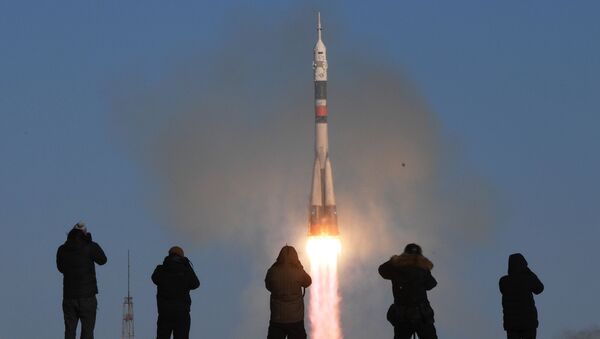 A Soyuz-FG rocket launches the Soyuz-MS-07 manned spacecraft from the Baikonur Space Center - Sputnik International