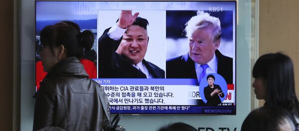 People pass by a TV screen showing file footages of U.S. President Donald Trump, right, and North Korean leader Kim Jong Un during a news program at the Seoul Railway Station in Seoul, South Korea, Monday, April 9, 2018 People pass by a TV screen showing file footages of U.S. President Donald Trump, right, and North Korean leader Kim Jong Un during a news program at the Seoul Railway Station in Seoul, South Korea, Monday, April 9, 2018 - Sputnik International