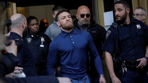 Mixed Martial Arts (MMA) fighter Conor McGregor exits after appearing in a Brooklyn court on charges of assault stemming from a melee, in the Brooklyn borough of New York City, U.S., April 6, 2018 - Sputnik International
