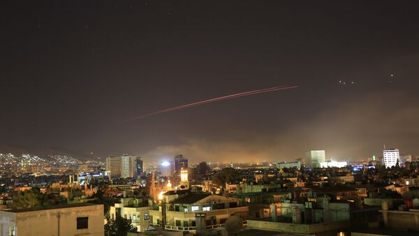 Damascus skies erupt with anti-aircraft fire as the U.S. launches an attack on Syria targeting different parts of the Syrian capital Damascus, Syria, early Saturday, April 14, 2018. Syria's capital has been rocked by loud explosions that lit up the sky with heavy smoke as U.S. President Donald Trump announced airstrikes in retaliation for the country's alleged use of chemical weapons. - Sputnik International