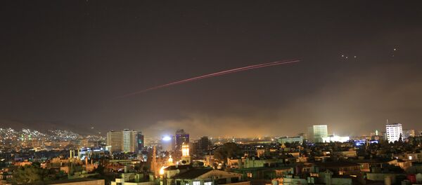 Damascus skies erupt with anti-aircraft fire as the U.S. launches an attack on Syria targeting different parts of the Syrian capital Damascus, Syria, early Saturday, April 14, 2018. Syria's capital has been rocked by loud explosions that lit up the sky with heavy smoke as U.S. President Donald Trump announced airstrikes in retaliation for the country's alleged use of chemical weapons. Damascus skies erupt with anti-aircraft fire as the U.S. launches an attack on Syria targeting different parts of the Syrian capital Damascus, Syria, early Saturday, April 14, 2018. Syria's capital has been rocked by loud explosions that lit up the sky with heavy smoke as U.S. President Donald Trump announced airstrikes in retaliation for the country's alleged use of chemical weapons. - Sputnik International
