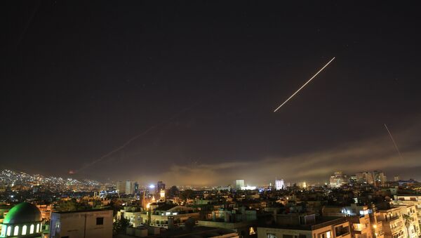 Damascus skies are alight as the U.S. launches an attack on Syria targeting different parts of the Syrian capital Damascus, Syria, early Saturday, April 14, 2018 - Sputnik International