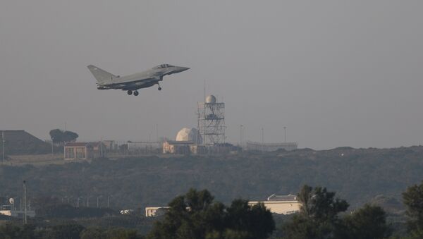 REMOVING FRENCH FROM DESCRIPTION A fighter jet prepares to land at RAF Akrotiri, a military base Britain maintains on Cyprus, April 14, 2018 - Sputnik International