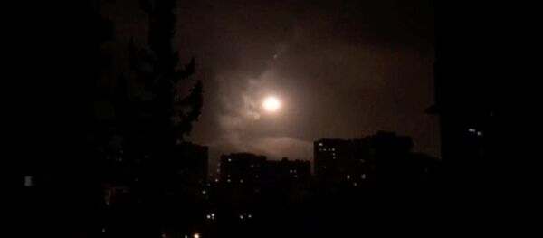 Syria air defences strike back after air strikes by U.S., British and French forces in Damascus, Syria in this still image obtained from video dated early April 14, 2018 - Sputnik International