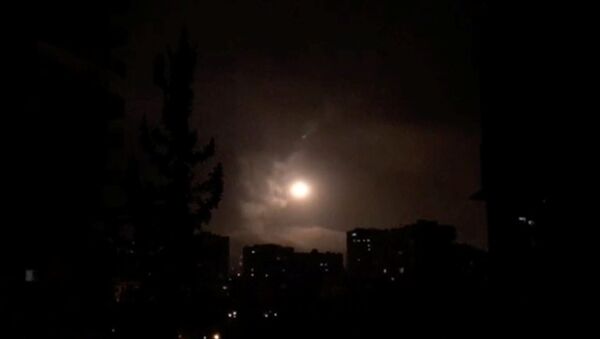 Syria air defences strike back after air strikes by U.S., British and French forces in Damascus, Syria in this still image obtained from video dated early April 14, 2018 - Sputnik International