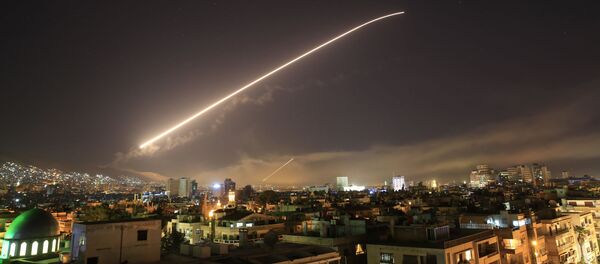 The Damascus sky lights up missile fire as the U.S. launches an attack on Syria targeting different parts of the capital early Saturday, April 14, 2018 - Sputnik International