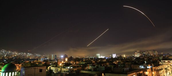 Missiles streak across the Damascus skyline as the U.S. launches an attack on Syria targeting different parts of the capital, early Saturday, April 14, 2018 Missiles streak across the Damascus skyline as the U.S. launches an attack on Syria targeting different parts of the capital, early Saturday, April 14, 2018 - Sputnik International