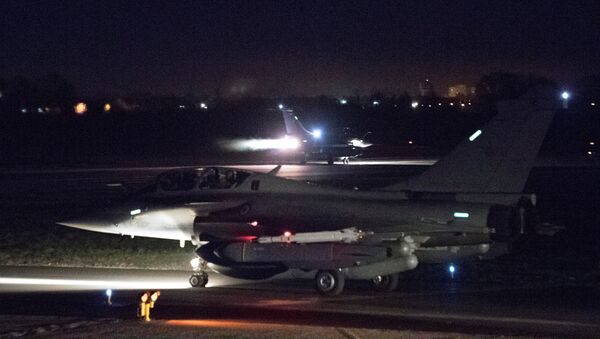 French Rafale fighter jets prepare to take off late April 13, 2018 from the Saint-Dizier military base in eastern France in this picture released April 14, 2018 by the French Military - Sputnik International