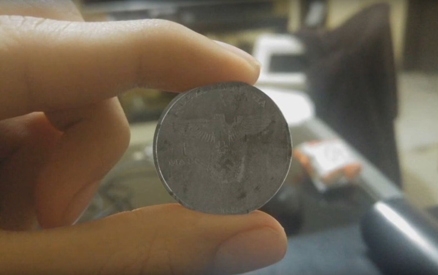 Mysterious Coin Like Artifact Prompts Nazism Revival Speculation